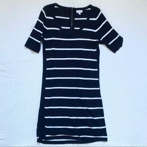 A pea in the pod black and white striped zip back maternity sweater dress